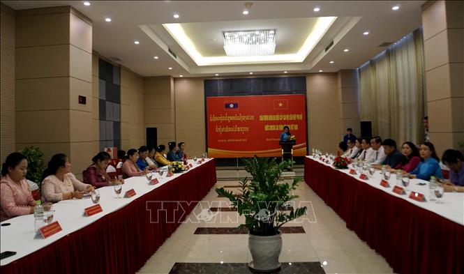 Quang cảnh buổi làm việc giữa lãnh đạo Tỉnh ủy Quảng Nam với Đoàn đại biểu Hội Liên hiệp Phụ nữ Lào. Ảnh: Trịnh Bang Nhiệm - TTXVN