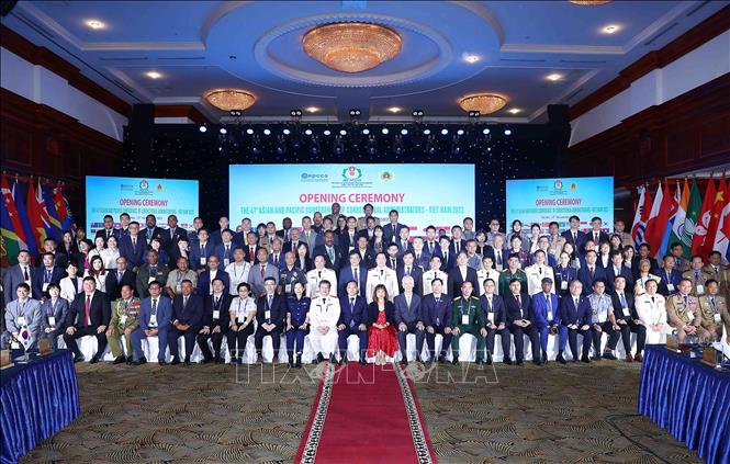 Delegates pose for a group photo. VNA Photo: Phạm Kiên 